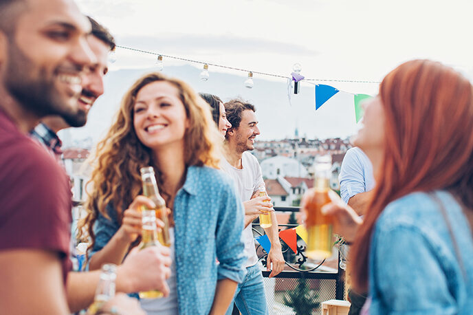 Teenagers drinking alcohol at a party | Alliant Private Client