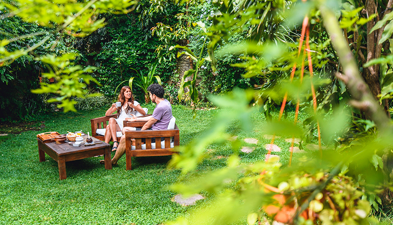 Couple sitting in their backyard having a conversation | Alliant Private Client