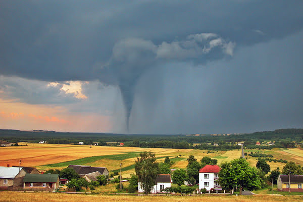 Tornado moving across field of houses | Alliant Private Client