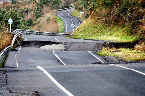 Collapsed road due to earthquake | Alliant Private Client