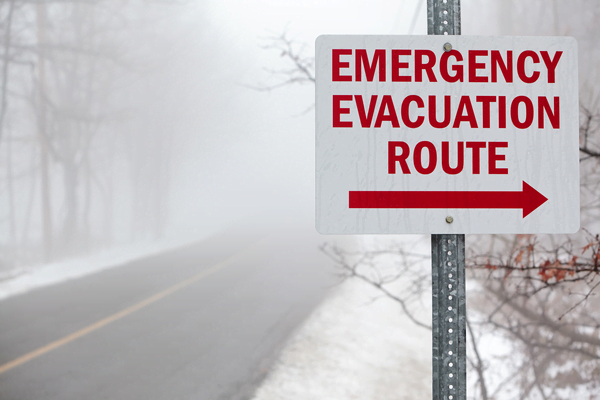 Emergency evacuation route sign on highway | Alliant Private Client